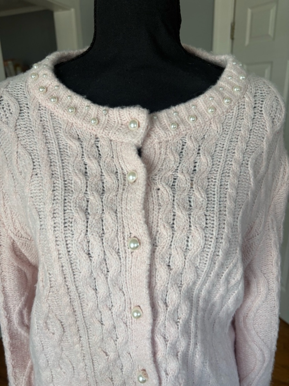 Pink cable knit cardigan with pearl buttons